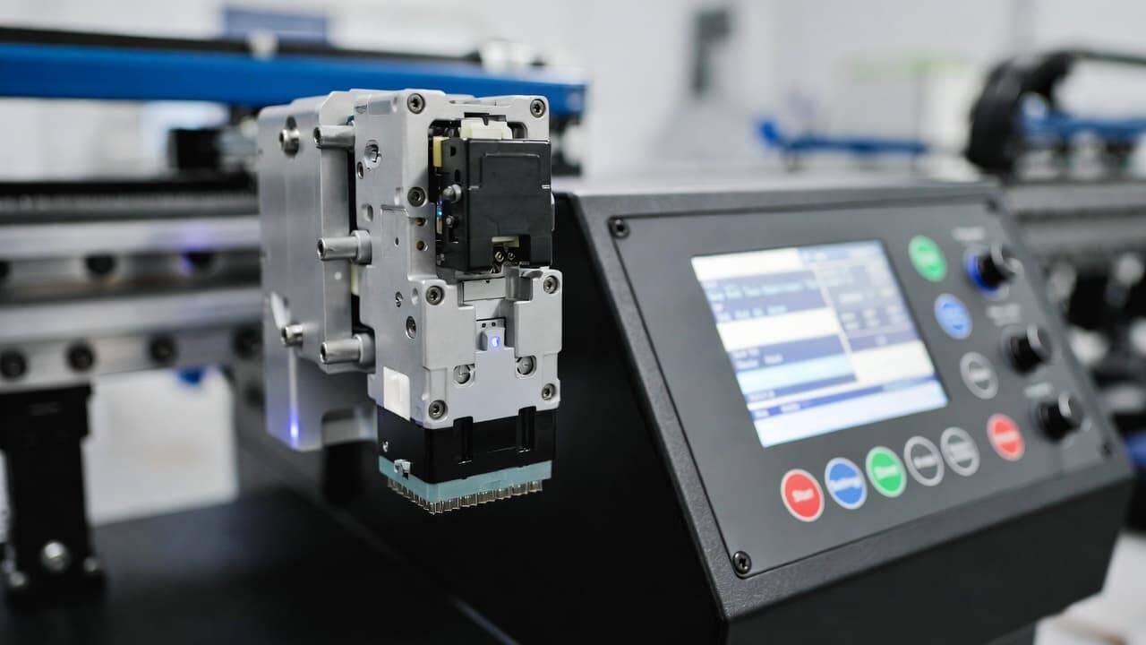 Professional DTG printer control panel and precision printhead technology close up