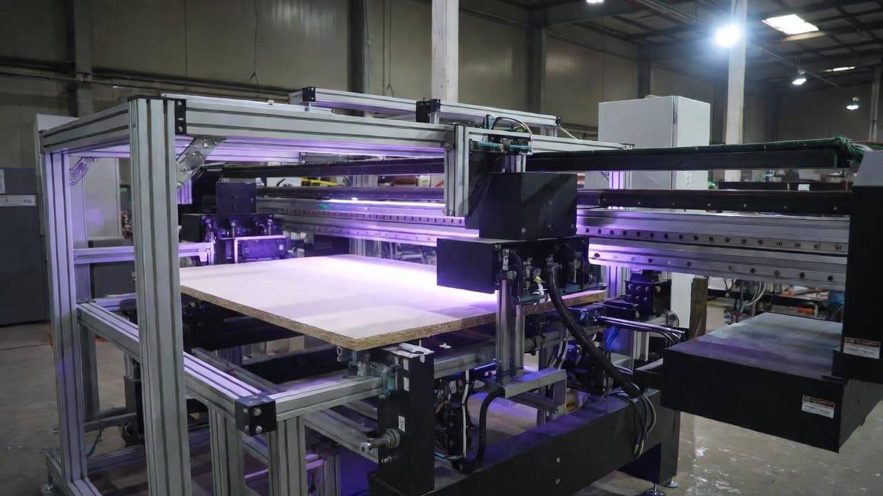 Industrial flatbed UV DTF printer used for bulk production