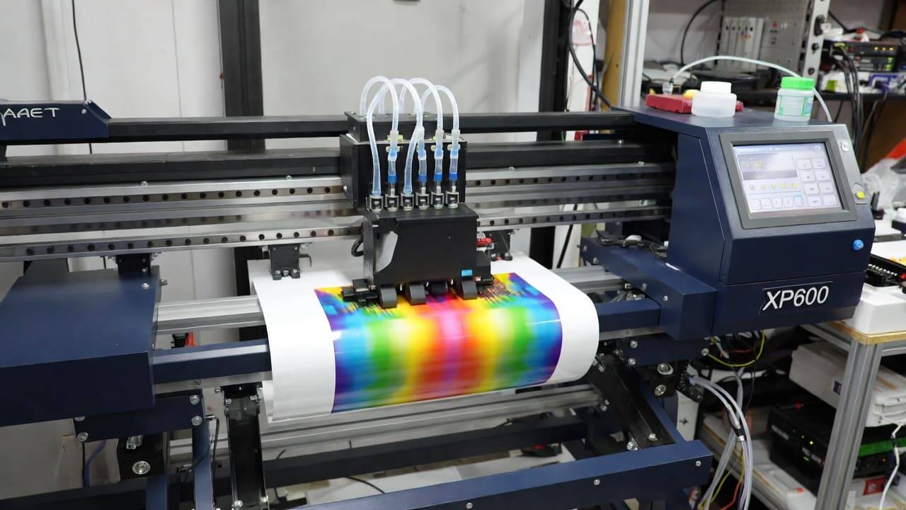 XP600 printhead mounted inside mid-range DTF printer for custom apparel production